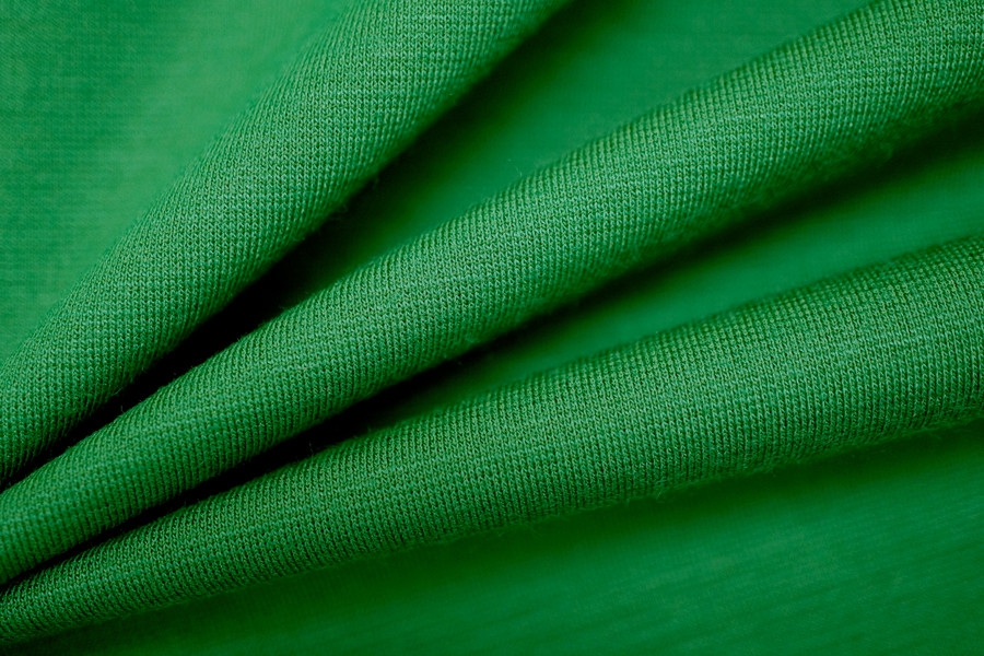 Хлопок зеленого цвета. Зеленая ткань. Ткань зеленая мягкая. Зеленая шерстяная ткань. Синтетическая зеленая ткань.