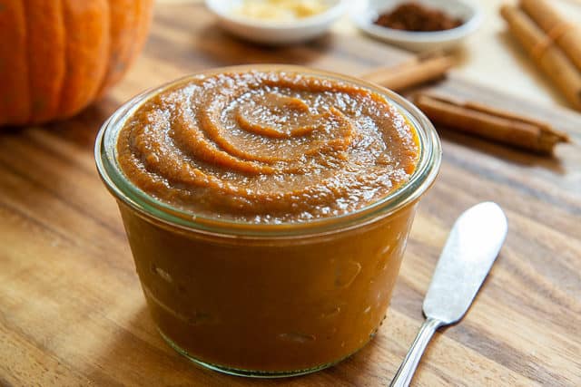 Pumpkin Butter Recipe - Served in a Glass Jar on Wooden Board